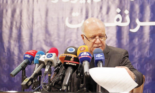 Iran’s Oil Minister Bijan Namdar Zangeneh says Tehran is currently negotiating with more than 20 foreign companies to develop its oil and gas fields. (AFP)
