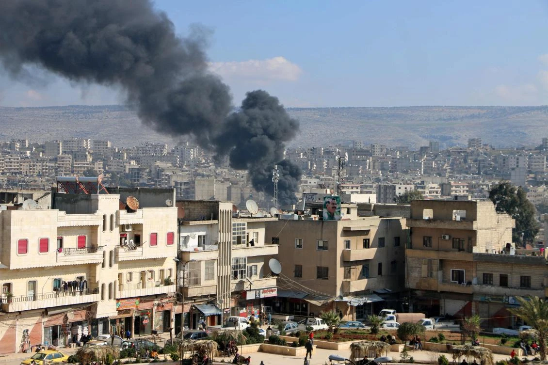 Smoke is seen billowing from the northern Syrian Kurdish town of Afrin on January 31, 2018. Turkey and allied Syrian rebel groups launched operation Olive Branch on January 20 against the Kurdish People’s Protection Units (YPG), which controls the Afrin region. (AFP)