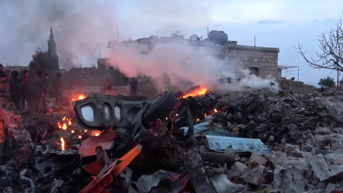 Above, fires caused by the Russian military plane that rebel forces shot down near Idlib in Syria. (Reuters)