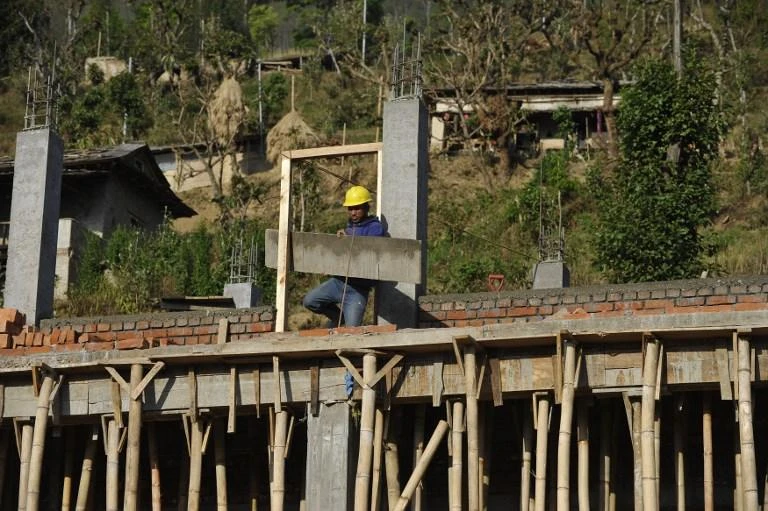 Nepal must punish recruitment agencies that charge migrant workers illegally high fees to find jobs abroad, according to the UN. (AFP)