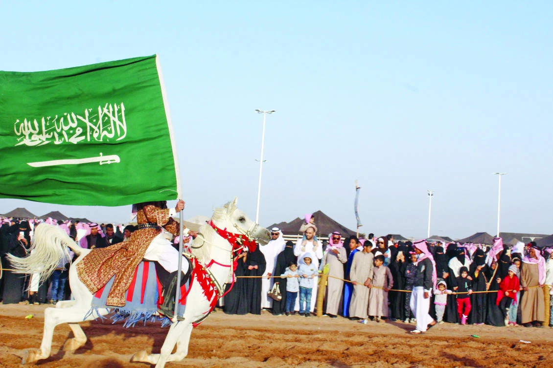 People enjoy the performance of a horse rider at a recent event in Madinah. (AN photo)