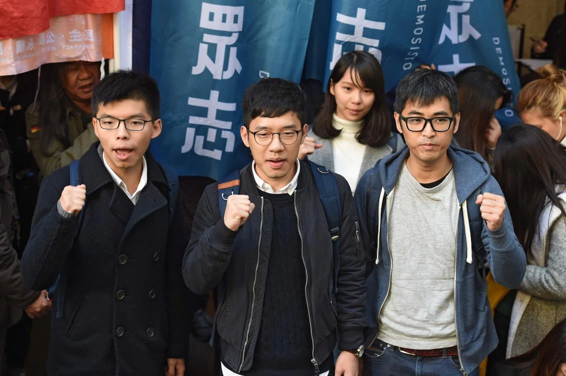 From left: Hong Kong democracy activists Joshua Wong, Nathan Law and Alex Chow were jailed in August last year for their role in the 2014 Umbrella Movement mass pro-democracy protests. (AFP)