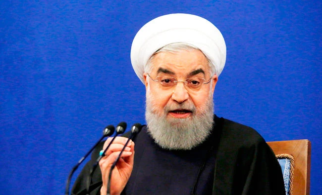 Iranian President Hassan Rouhani speaks during a press conference in Tehran on Tuesday, to mark the 39th anniversary of Iran's Islamic revolution. (AFP)
