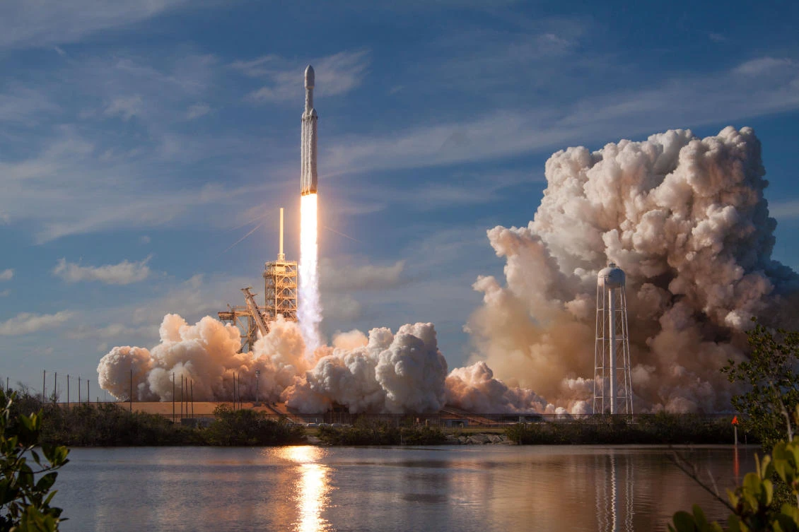 The SpaceX Falcon Heavy rocket, with its cherry red Tesla Roadster payload, lifts off from historic launch pad 39-A at the Kennedy Space Center in Cape Canaveral, Florida. (SpaceX via Reuters)