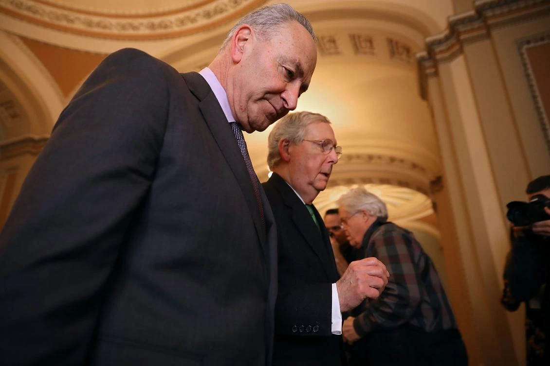 US Senate Minority Leader Charles Schume (L) and US Senate Majority Leader Mitch McConnell walk to the Senate Chamber at the U.S. Capitol. (Getty Images/AFP)