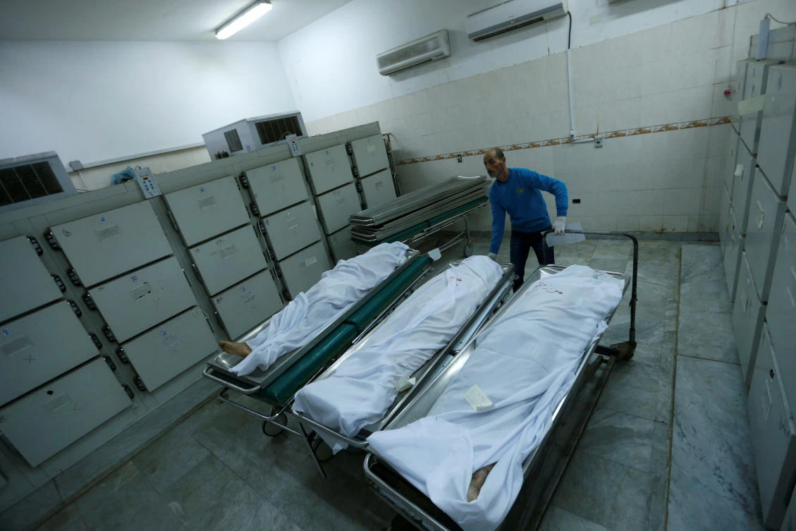 Bodies of Pakistani migrants who died when a boat sank off Libya's western coast, are seen in Tripoli Central Hospital in Tripoli, Libya. (Reuters)
