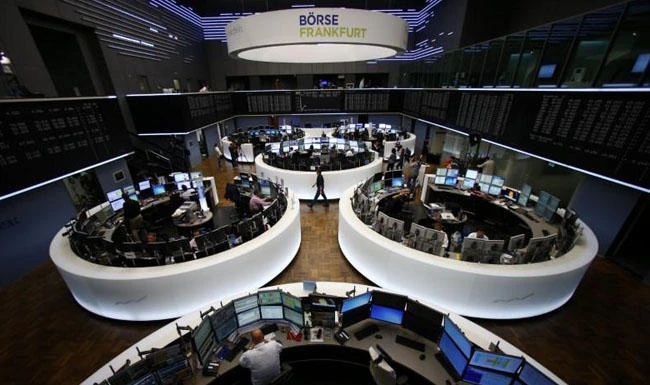 Above, general view of the Frankfurt stock exchange in Germany. Europe’s STOXX 600 share index fell 0.2 percent by 0830 GMT, pulled lower by a 1.1 percent fall in basic resources and weaker industrials stocks. (Reuters)