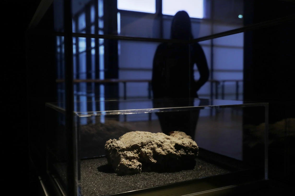 In this photograph, the only remaining piece of the 130 ton, 250 meter long fatberg, removed from the sewers in east London, is displayed during a media preview at the Museum of London.(AP)