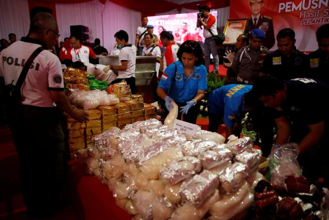 In this file photo,officers from various Indonesian drug enforcement agencies prepare confiscated narcotics to be destroyed in an incinerator following a ceremony in Jakarta, Indonesia.(Reuters)