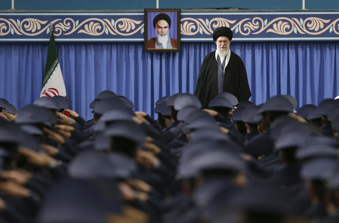 Iranian Supreme Leader Ayatollah Ali Khamenei stands as army air force and air defense staff salute at the start of their meeting in Tehran, Iran, Thursday, Feb. 8, 2018. (AP)