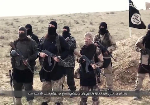 Daesh fighters are seen in an undated video. (AP)