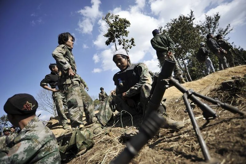 In this file photo, soldiers of Kachin Independence Army (KIA) man their position at the front line in Kachin state. (Reuters)
