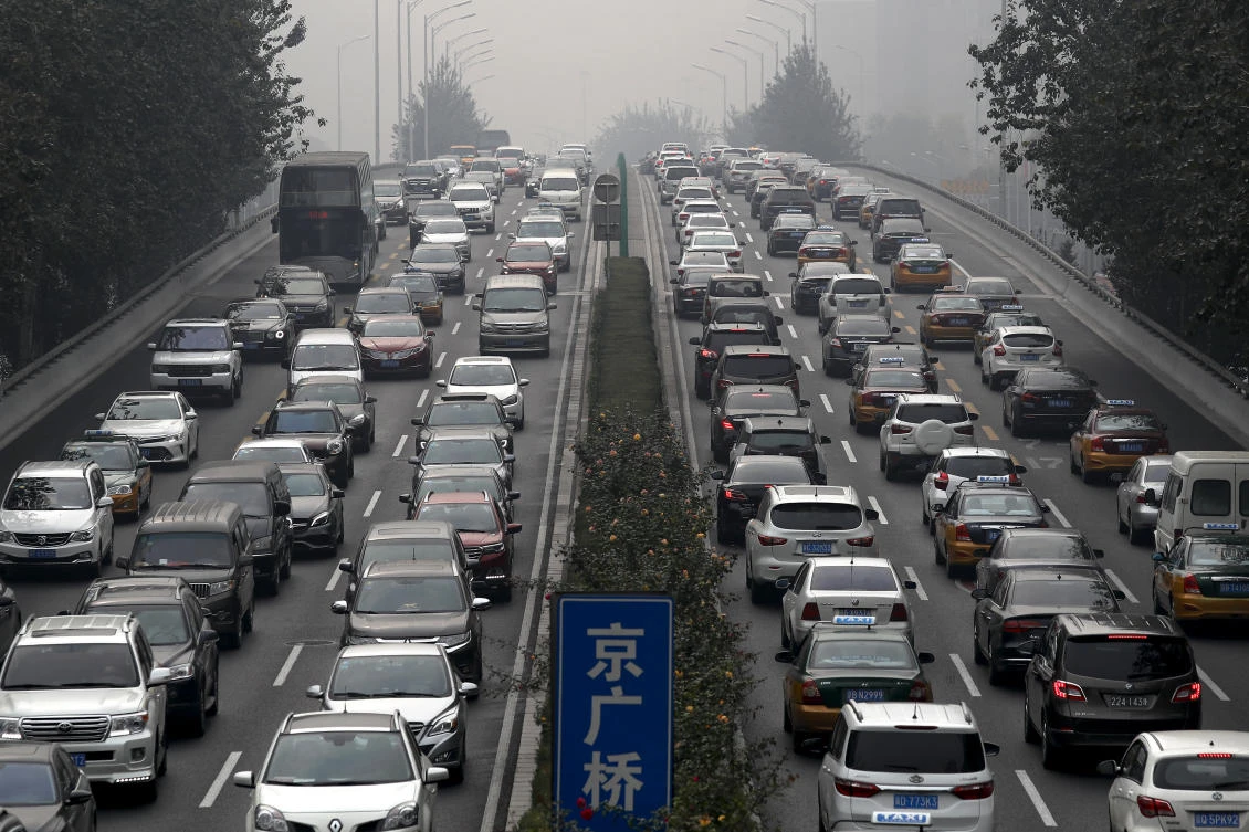 Heavy traffic on a city ring road in Beijing. China’s crude imports climbed to a record 9.57 million bpd in January. (AP)