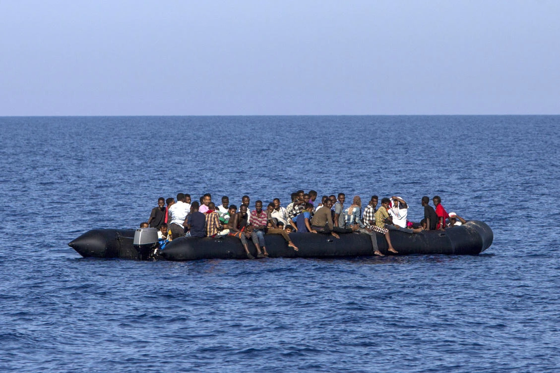 File photo showing African migrants at sea