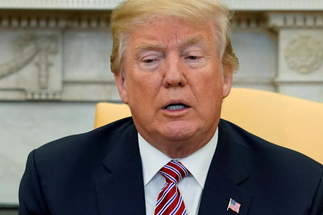Trump blocks release of Democratic memo on Russia probe