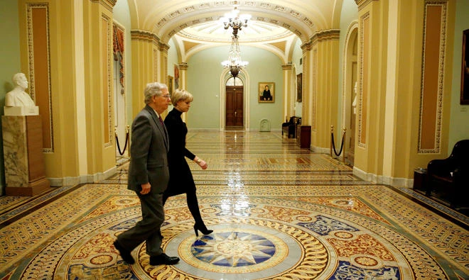 Senate Majority Leader Mitch McConnell (R-KY) walks to the Senate floor before a vote to end a government shutdown on Capitol Hill in Washington, US. (Reuters)