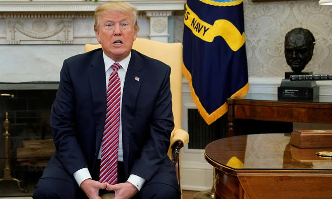 Trump laments ‘shattered’ lives after aides resign