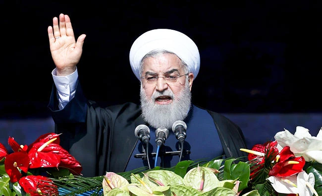 Iranian President Hassan Rouhani delivers a speech during a rally marking the 39th anniversary of the 1979 Islamic Revolution, in Tehran, Iran, on Sunday. (AP)
