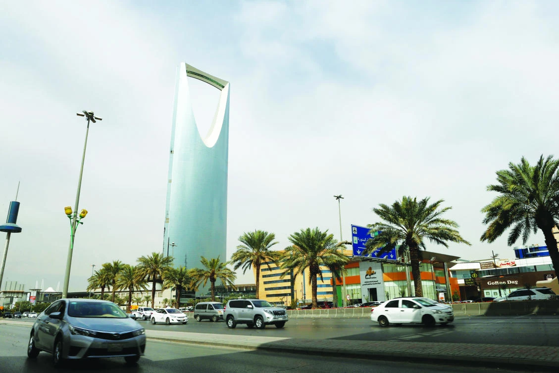 Cars pictured in downtown Riyadh. Recently introduced grants are boosting average Saudi household income but expatriates are being hit. (Reuters)