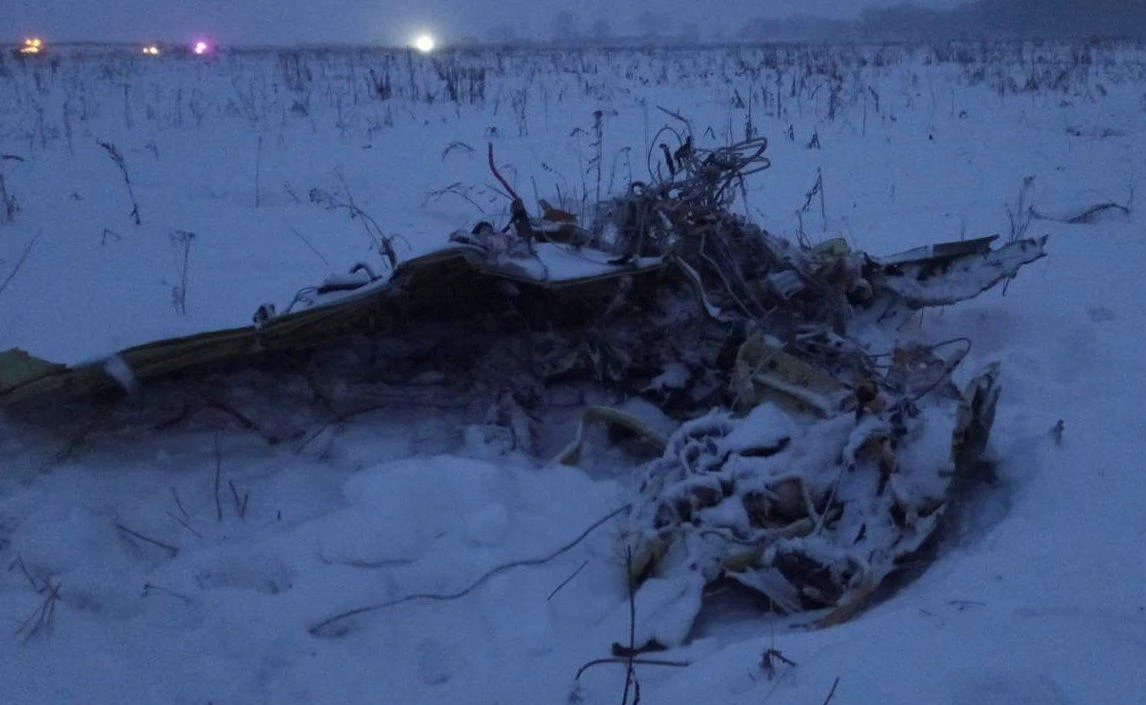 A part of a Saratov Airlines Antonov AN-148 plane that crashed after taking off from Moscow's Domodedovo airport, is seen at the scene of the incident outside Moscow. (REUTERS)