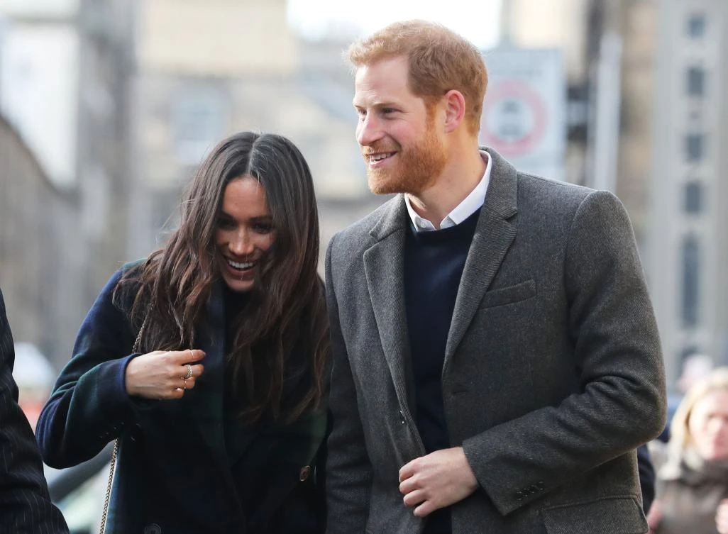 Britain’s Prince Harry and his fiancée, US actress Meghan Markle arrive at Social Bite, a social enterprise cafe in Edinburgh during their visit to Scotland. (AFP)