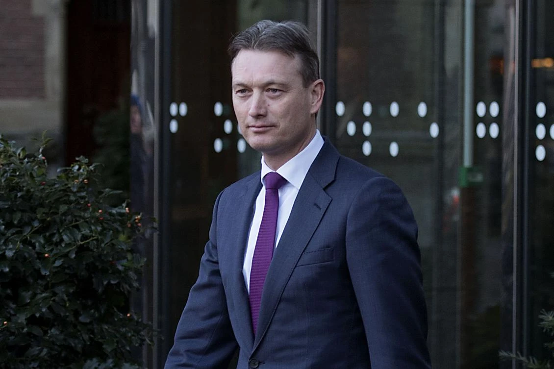 Dutch Minister of Foreign Affairs Halbe Zijlstra leaves the Dutch parliament Tweede Kamer after he announced his resignation in The Hague on February 13, 2018, after admitting he had lied about his presence at a meeting with Russian President Vladimir Putin. (AFP)