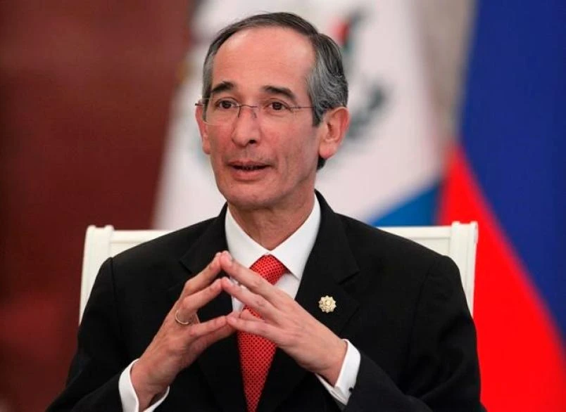 Former Guatemalan President Alvaro Colom has been arrested pending an investigation into buses bought during his administration for a large public transport program. (AP Photo)