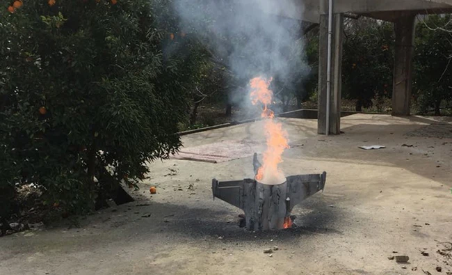 The remains of a missile that crashed earlier in Alonei Abba, east of Haifa, in northern Israel. Syrian ragime said they repelled Israeli surveillance planes. (AFP)