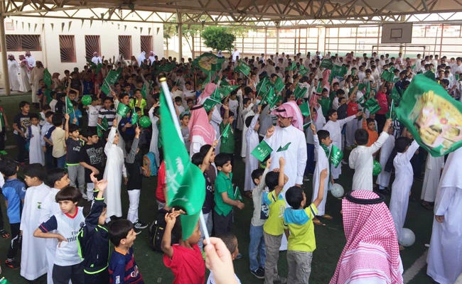 School children in Taif gather during a National Day celebration in this file photo. Schools in Taif are closed on Thursday due to bad weather. (SPA)