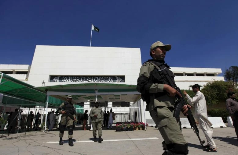 Paramilitary soldiers walk past the Parliament building in Islamabad. The US has called for Pakistan to be placed on a ‘grey list’ of countries deemed to be doing too little to comply with anti-terrorist financing and anti-money laundering regulations. (Reuters)