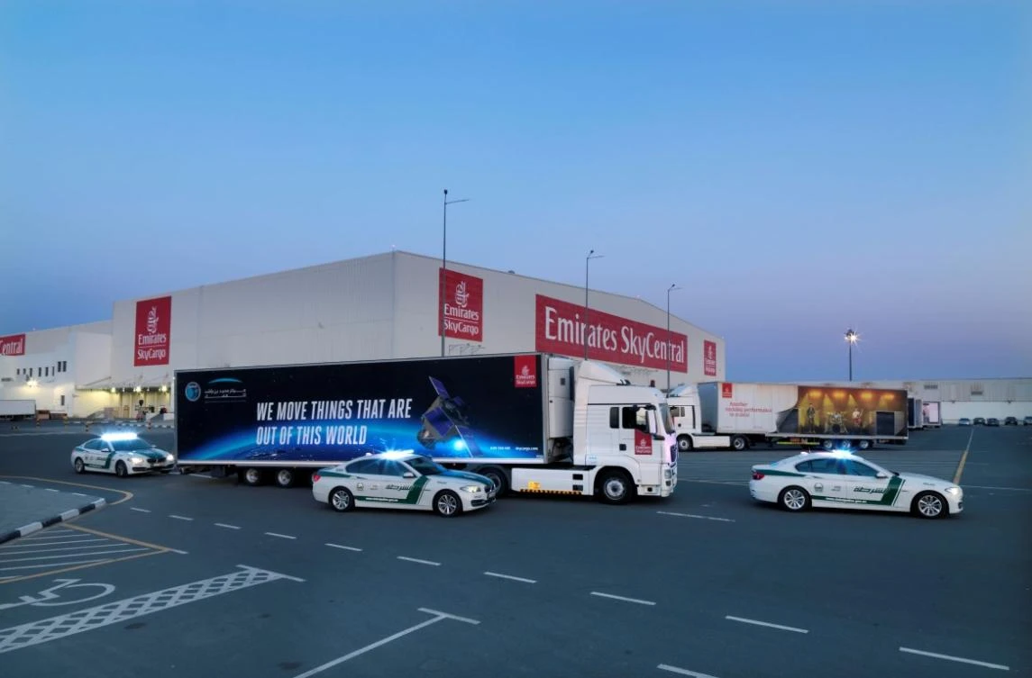 Photo showing ‘KhalifaSat’transported to Emirates Airlines SkyCargo terminal in Dubai, Feb 15, 2018 (WAM)