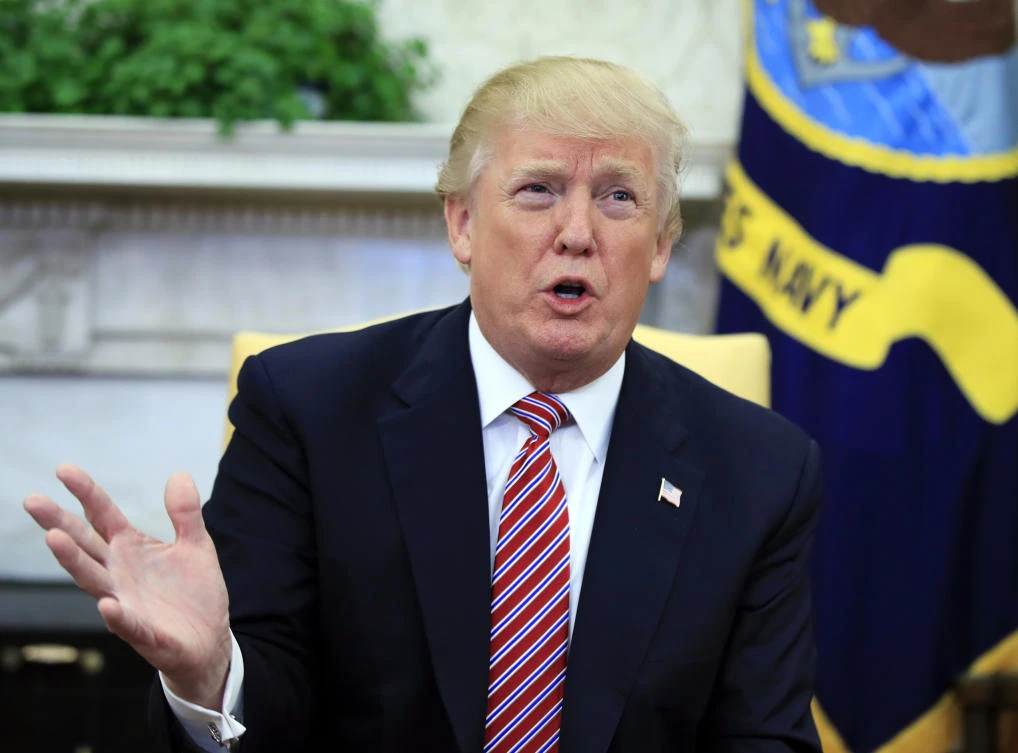 Thirteen Russians and three Russian companies were charged Friday with an elaborate plot to interfere in the 2016 US presidential election through social media propaganda aimed at helping Republican Donald Trump. (AP)