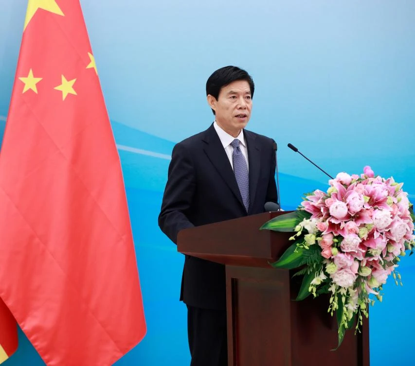 China's Commerce Minister Zhong Shan delivers his speech during the opening ceremony for the Sino-German Center for Sustainable Development at the Ministry of Commerce in Beijing on May 11, 2017. (AFP)