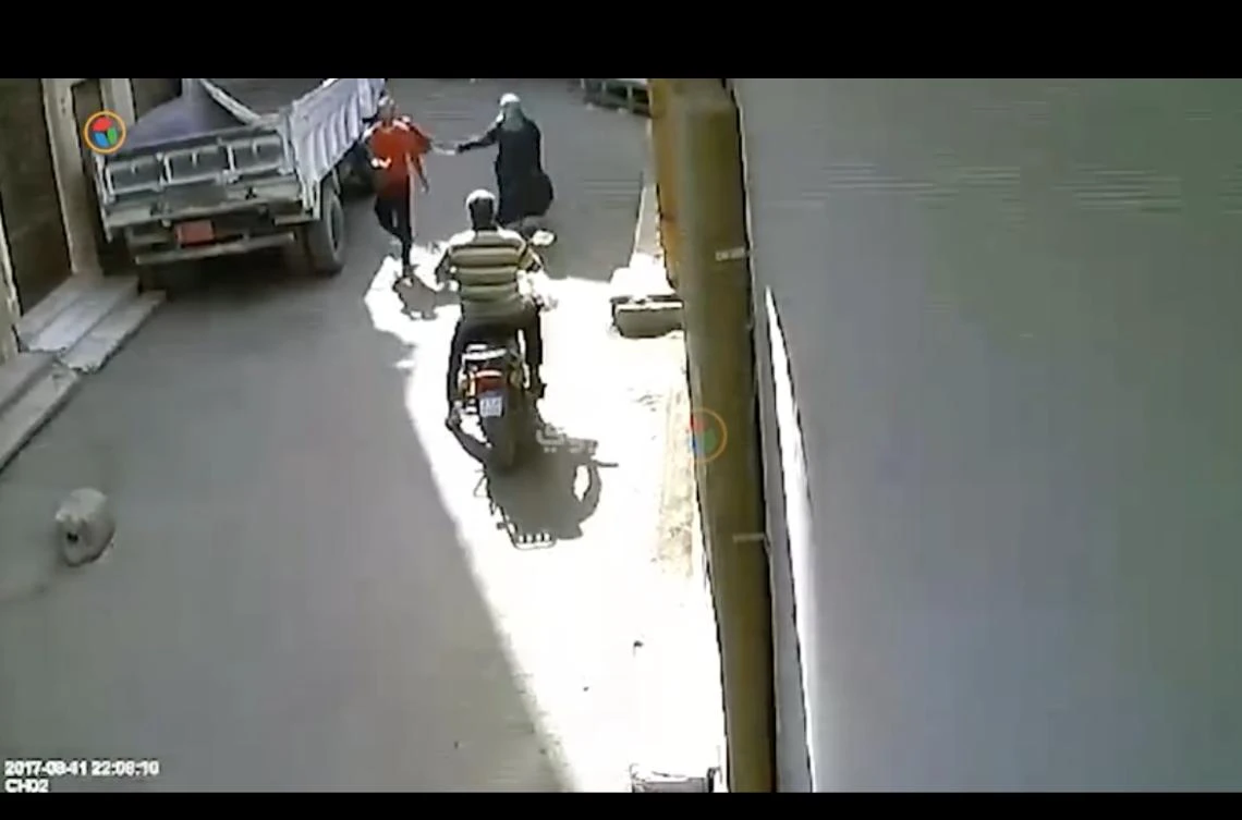 Screen shots from the video showing the woman arresting her harasser. (YouTube)