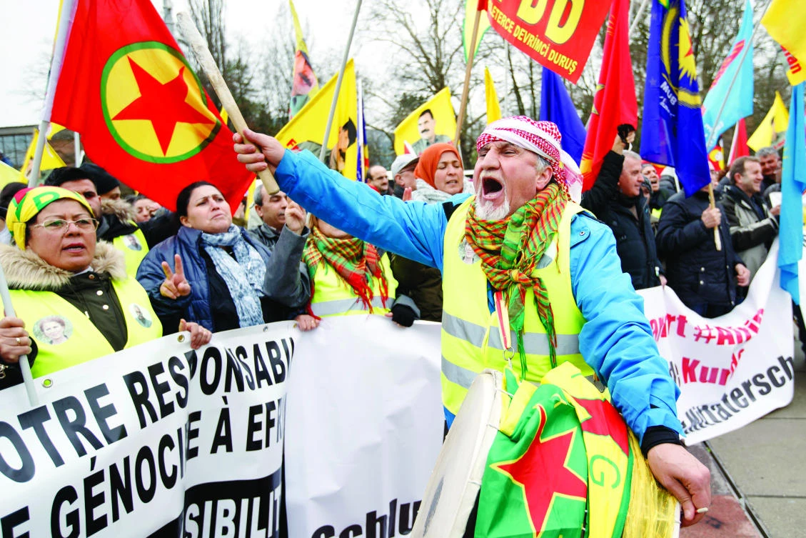 Pro-Kurdish demonstrators protest in Geneva against Turkish operations in the northern Syrian city of Afrin. (AP)
