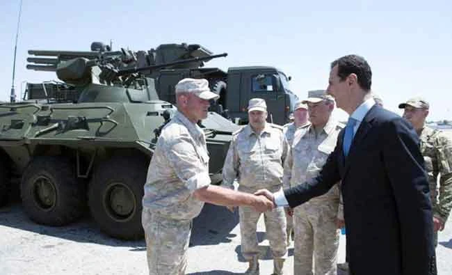 Syria's President Bashar al-Assad visits a Russian air base at Hmeymim, in western Syria in this handout photo posted on SANA on June 27, 2017, Syria. (REUTERS)