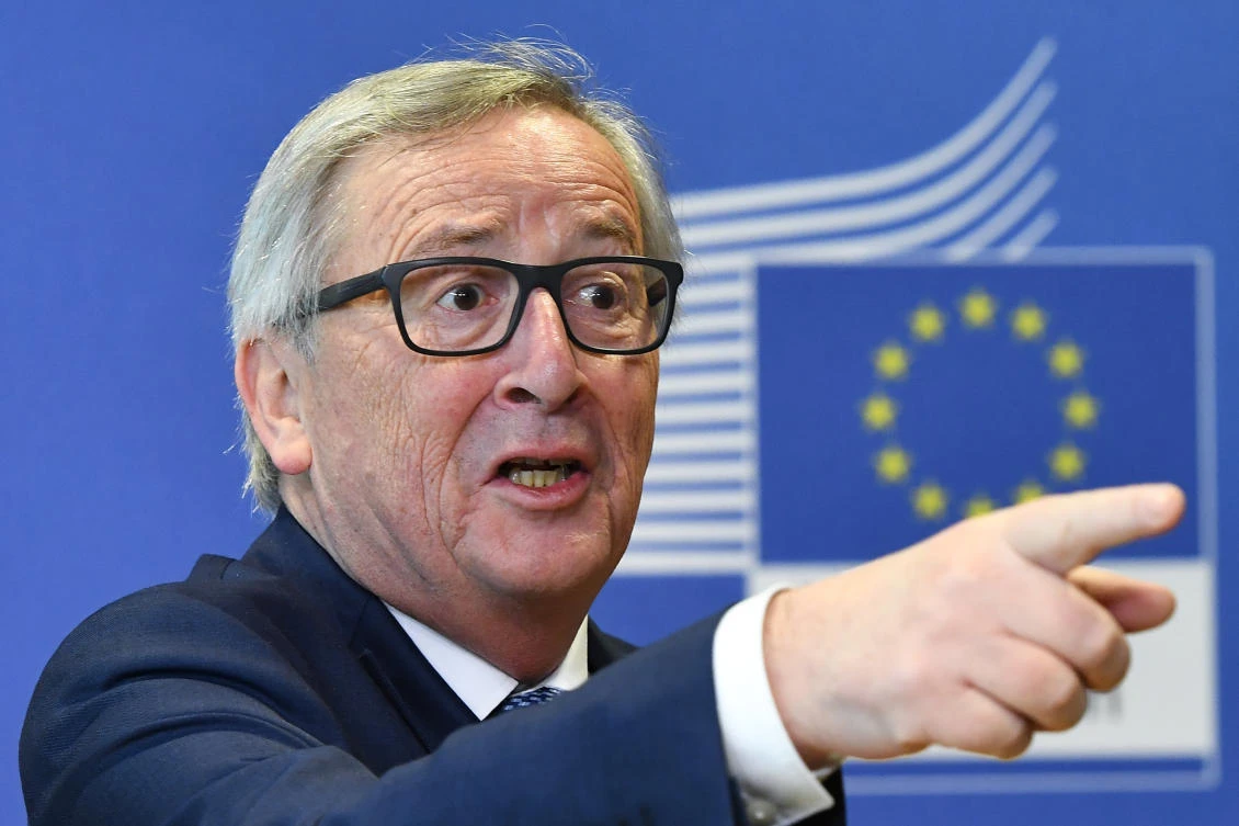 European Commission President Jean-Claude Juncker gestures toward a journalist. (Emmanuel Dunand/AFP)