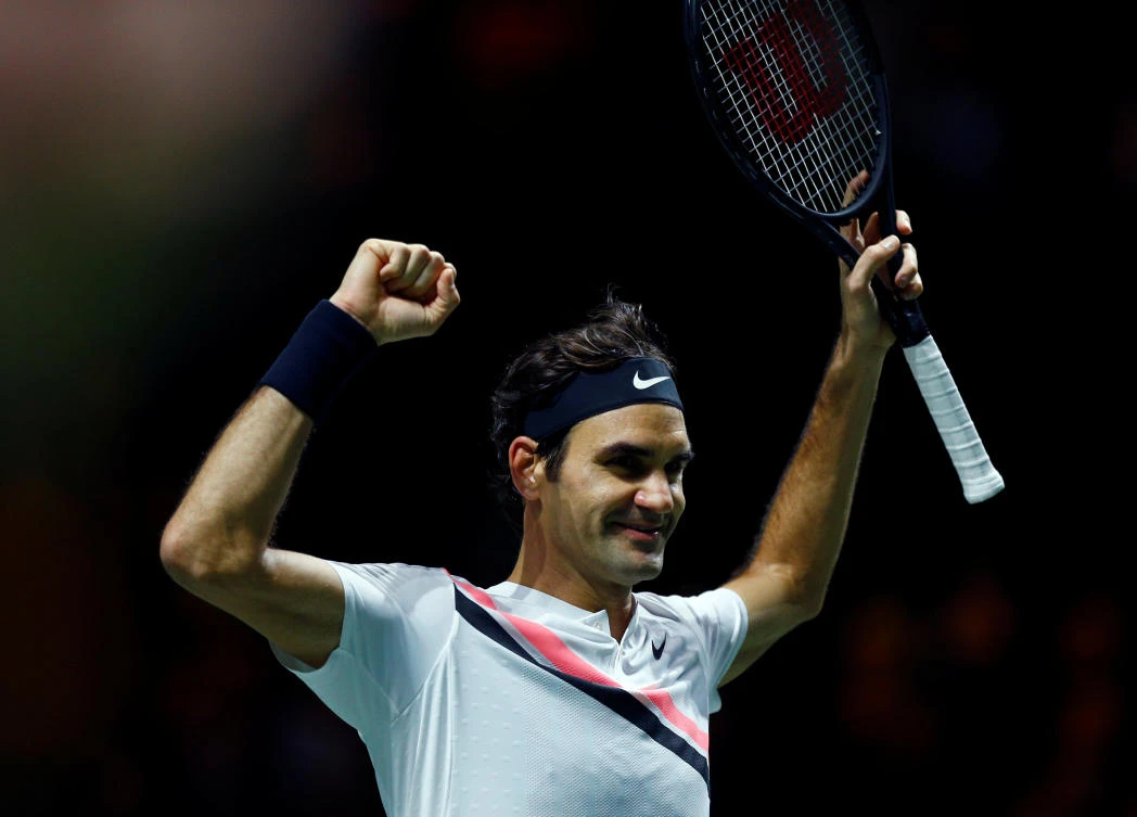 Roger Federer celebrates after winning against Grigor Dimitrov. (Reuters)