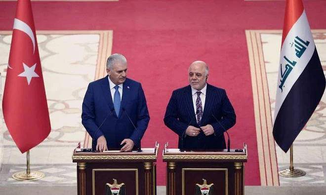 Turkey’s Prime Minister Binali Yildirim and his Iraqi counterpart Haider Al-Abadi during a joint news conference in Baghdad on Jan. 7. (Reuters/file)