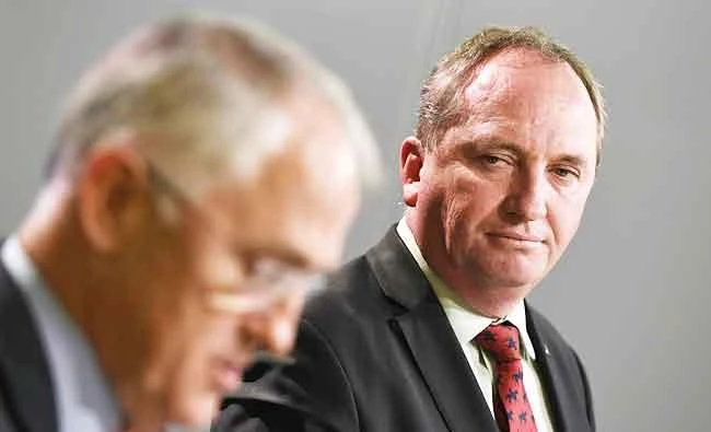 The Australian High Court decision against Deputy Prime Minister Barnaby Joyce, right, has left Prime Minister Malcolm Turnbull’s coalition in the precarious position of a minority government. (AFP)
