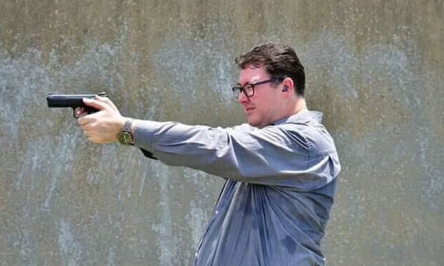 Australia politician slammed for Facebook gun photo