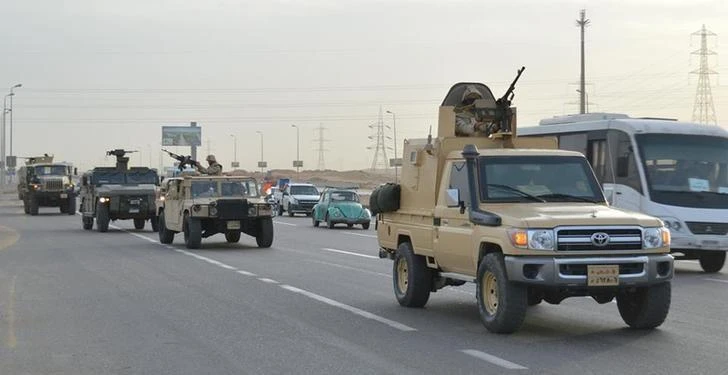 Above, armored vehicles of the Egyptian army on their way to Sinai during a launch of a major assault against militants in this handout picture made available by the Ministry of Defense. (Ministry of Defense via Reuters)
