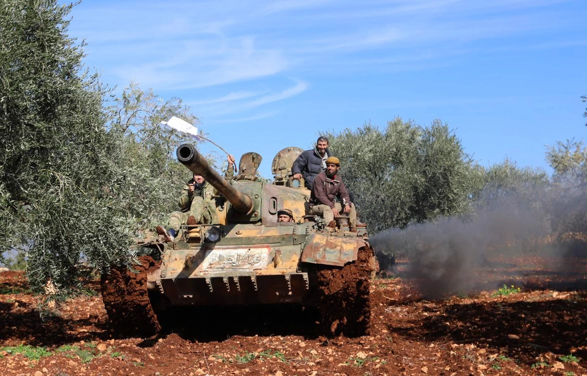 Turkish-backed Syrian rebel fighters are seen in the town of Salwah, less than 10 kilometres from the Syria-Turkey border on February 19, 2018. (AFP)