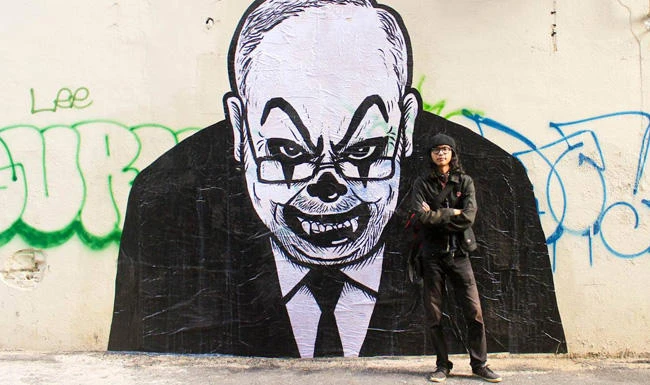 Malaysian court jails, fines artist for clown caricature of Najib Razak