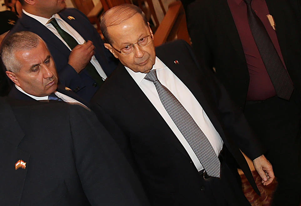 Lebanese President Michel Aoun (C) is seen during a visit to the Church of Our Lady of Deliverance in Baghdad’s Karrada neighborhood on Feb. 20, 2018. (Sabah Arar/AFP)