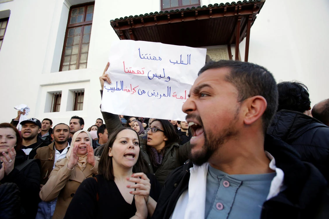 Algerian doctors, who are completing their residency stage of their studies, shout slogan during a sit-in protest in Algiers, Algeria. (Reuters)
