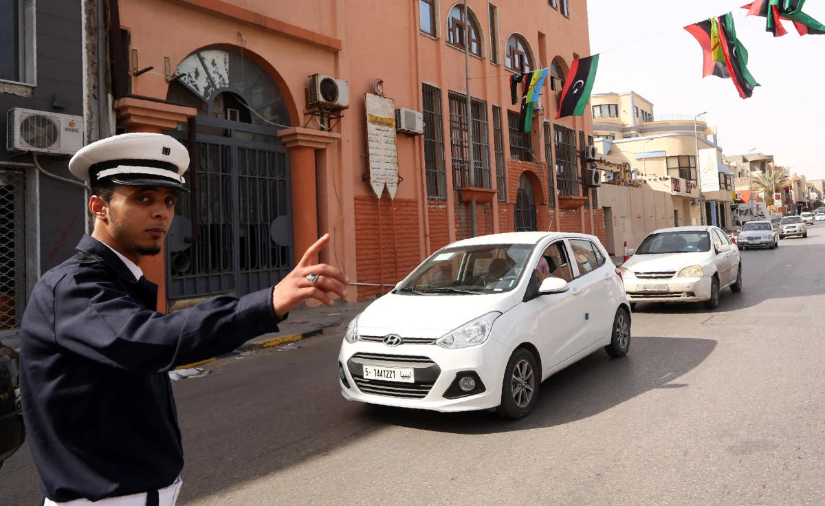 A Libyan traffic policeman directs vehicles on a street of the capital Tripoli. (File Photo: AFP)