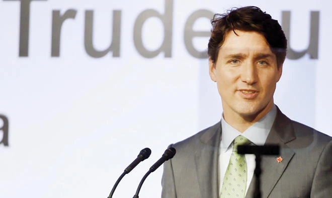 Prime Minister of Canada Justin Trudeau speaks during the India Canada business session in New Delhi on Thursday. (AFP)