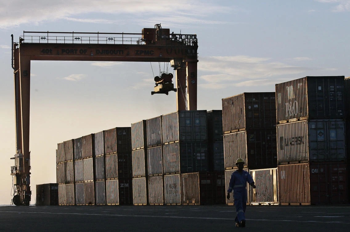 A worker walks in the container terminal of the port of Djibouti, in the tiny Horn of Africa Repubblic of Djibouti. (File Photo: AFP)