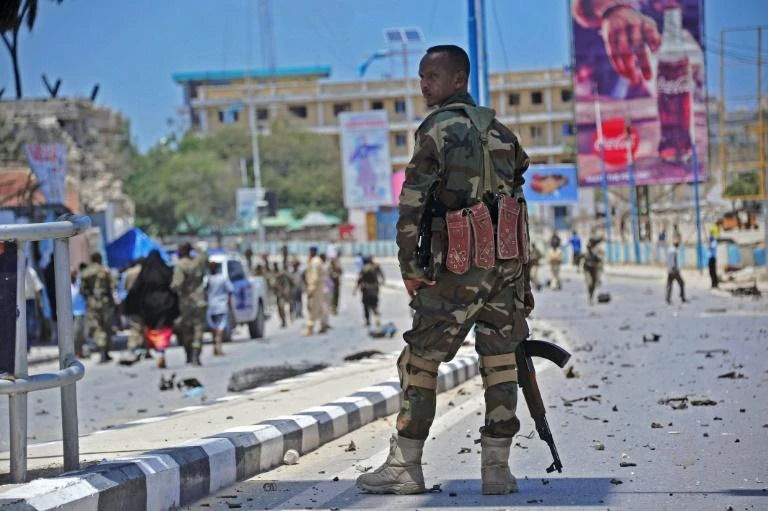 Somali security forces guard the site of a suicide blast in Mogadishu in 2016. Two explosions on Friday have shattered a months-long period of calm in the Somali capital. (AFP)
